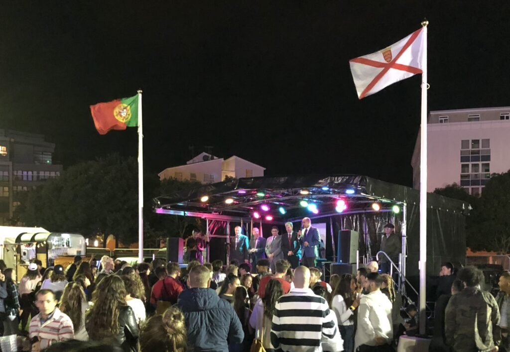planning.je jersey portuguese festival stage flags